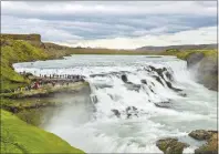  ?? GETTY IMAGES ?? Fed by the glacier water of the Hvita River, the Gullfoss waterfall descends into Iceland’s Gullfossgj­úfur canyon.