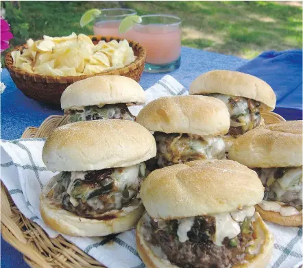  ?? — THE ASSOCIATED PRESS ?? Beer-steamed chili cheeseburg­ers are a delicious end-of-summer indulgence.