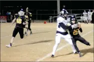  ?? MARK HUMPHREY ENTERPRISE-LEADER ?? Prairie Grove sophomore cornerback Cody Kruse (5-5, 108 pounds) battles Pottsville’s Bradlee Denney (6-0, 200 pounds) for possession of a pass in the fourth quarter. Prairie Grove handed Pottsville a 56-21 playoff loss Friday.