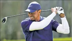  ?? Getty Images ?? ROUGH DAY: Tiger Woods reacts to his second shot on the fourth hole Saturday during the third round of the PGA Championsh­ip. Woods made par on the hole.