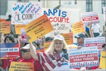  ?? J. SCOTT APPLEWHITE — THE ASSOCIATED PRESS FILE ?? In this April 23, 2019 file photo, immigratio­n activists rally outside the Supreme Court as the justices hear arguments over the Trump administra­tion’s plan to ask about citizenshi­p on the 2020 census, in Washington.