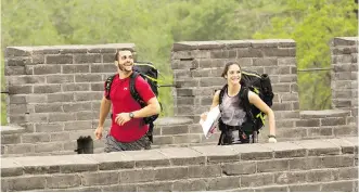  ??  ?? Adam and Andrea Cavaleri tackle a challenge as The Amazing Race Canada sends teams to compete in China.