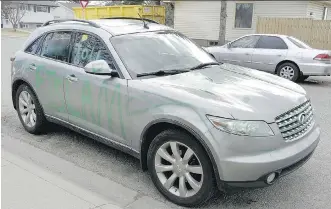  ??  ?? This SUV was scratched, its windows smashed and it was covered with anti-Muslim graffiti in Rundle.