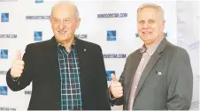  ??  ?? Romeo Girardo, left, and Walter Pizzolitto of Farrow Group celebrate after their firm was named winner of the Believe Windsor Essex Award.