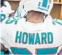  ?? MIAMI DOLPHINS/COURTESY ?? The Miami Dolphins unveiled the team’s new uniforms, which features a slight change in the team's color scheme. The orange is going back to original (darker) and the marine blue was removed from the outlines of the stripes, numbers and names.