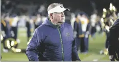  ?? DARRON CUMMINGS
AP PHOTO/ ?? Notre Dame head coach Brian Kelly leaves the field following an NCAA college football game against Georgia Tech Nov. 20 in South Bend, Ind.