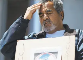  ?? Mason Trinca 2018 ?? Jose Delgado, whose son Jesus Adolfo DelgadoDua­rte was killed in a shootout with police, takes part in a protest in April 2018 against police shootings.