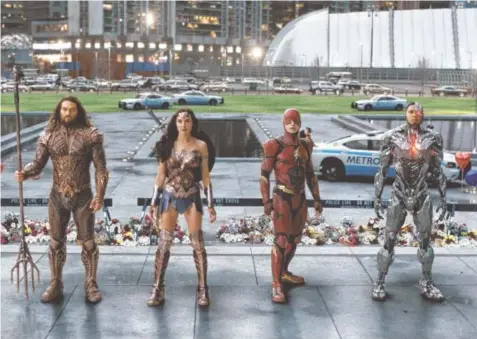  ?? WARNER BROS. ENTERTAINM­ENT I NC. ?? Jason Momoa, from left, Gal Gadot, Ezra Miller and Ray Fisher in a scene from “Justice League.”