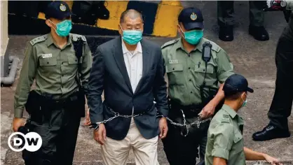  ??  ?? Hong Kong media mogul Jimmy Lai walks to a prison van ahead of a court hearing on Saturday