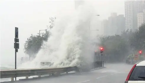  ?? Picture / AP ?? Typhoon Haima hit Hong Kong yesterday with wind gusts of up to 96km/ h.