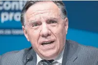  ?? PAUL CHIASSON THE CANADIAN PRESS ?? Quebec Premier François Legault’s approval rating is not exclusivel­y related to a pandemic- induced rally but is a mix of political chemistry and good timing, Chantal Hébert writes.
