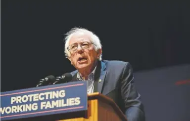  ?? Lisa Lake, Getty Images North America ?? U.S. Senator Bernie Sanders speaks on stage during the Protecting Working Families Rally to stand up against the horrific GOP tax proposal, hosted by Not One Penny, and Moveon.org at Santander Performing Arts Center on December 3, 2017 in Reading,...