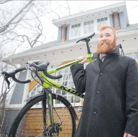  ?? KAYLE NEIS ?? Brodie Thompson of Saskatoon Cycles, in front of his home in Saskatoon on Wednesday, wants city bike rules brought up to date.