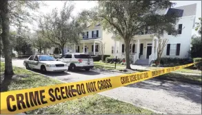  ?? Joe Burbank / Associated Press ?? A file photo of Osceola County Sheriff’s Office patrol cars outside a home in Celebratio­n, Fla., on Jan. 15, 2020. Authoritie­s charged Anthony Todt with killing his wife, their three young children and the family’s dog in the affluent suburb near Walt Disney World.