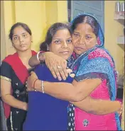  ?? HT PHOTO ?? Simranjit Kaur, who was rescued from Dubai, hugs her mother at their house in Pandori Gola village of Tarn Taran on Sunday.