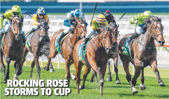  ?? ?? Tralee Rose, with Dean Holland in the saddle, charges home to win Wednesday’s Geelong Cup. Picture: Racing Photos via Getty