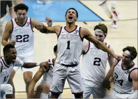  ?? MICHAEL CONROY — THE ASSOCIATED PRESS ?? Gonzaga guard Jalen Suggs celebrates making the game winning basket April 3.