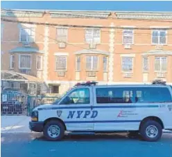  ??  ?? Cops came to check on Teresita Rosario (left) at her building (above) on Clinton Ave. in Belmont on Saturday and found the mom of two dead.