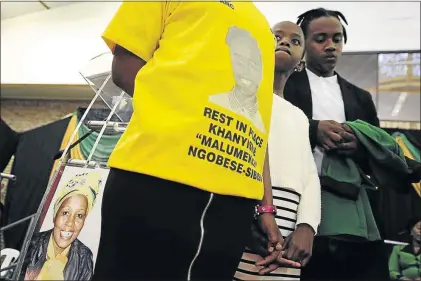  ?? PHOTOS: THULANI MBELE ?? SAD FAREWELL: Children of slain ANC ward candidate Khanyisile Ngobese-Sibisi at her funeral. She was killed while giving out blankets to the elderly in Ladysmith, KwaZulu-Natal
