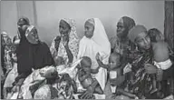  ??  ?? Mothers and their children wait for a checkup at a health facility in Maiduguri, north-east Nigeria. Conflict has left many farmers unable to plant or harvest their crops. (TheGuardia­n.com)