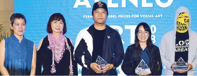  ??  ?? At the Ateneo Art Awards are Boots Herrera of Ateneo Art Gallery, The Philippine STAR Lifestyle editor Millet Mananquil, and this year’s winners of the Fernando Zobel Prizes for Visual Art: Ronson Culibrina, Johanna Helmuth and KoloWn.