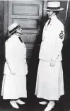  ?? ASSOCIATED PRESS FILE PHOTO ?? Two female members of the U.S. Navy’s Yeoman unit pose in their chin strap hats, ties, jackets and long skirts in New York City during World War I.