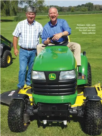  ??  ?? McGivern, right, with Jim Bandsma, Horicon fire chief and John
Deere collector