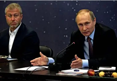  ??  ?? Vladimir Putin with Roman Abramovich, Sochi, Russia, July 2016