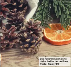  ?? ?? Use natural materials to make festive decoration­s. Photo: Alamy/PA