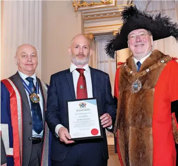  ?? ?? Forest of Dean based lime plasterer Ben Kerslake was awarded Master Plasterer Status by the Lord Mayor of London