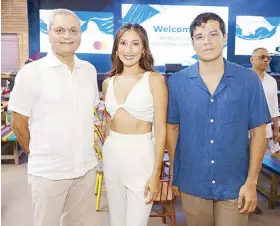  ?? ?? Security Bank president and CEO Sanjiv Vohra (left), joined by brand ambassador­s Solenn Heussaff and Erwan Heussaff, at the bank’s launch of its new sustainabl­e, no-annual-fee Wave Mastercard, at The Island at The Palace in Bonifacio Global City on Feb. 5.