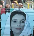  ?? ASSOCIATED PRESS ?? A memorial is held in Pakistan days after Benazir Bhutto’s death.