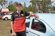  ??  ?? 2017 Bathurst 1000 winner Luke Youlden judging the cars on show at Picnic Point yesterday.