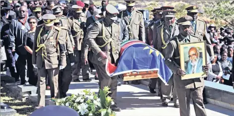  ?? Pictures: SIYABULELA DUDA ?? COMRADES IN ARMS: Pallbearer­s in procession during the Hero’s Funeral of Comrade Herman Andimba Toivo Ya Toivo at Heroes’ Acre in Windhoek, Namibia.