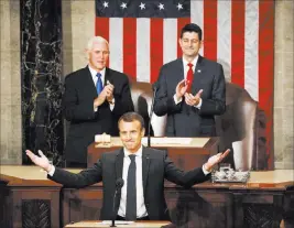  ?? Pablo Martinez Monsivais ?? The Associated Press French President Emmanuel Macron gestures Wednesday as he arrives for his address to a joint session of Congress on Capitol Hill.