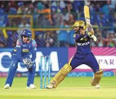  ?? PTI ?? Kolkata Knight Riders’ captain Dinesh Karthik cuts the ball to the fence during the seven-wicket win against Rajasthan.