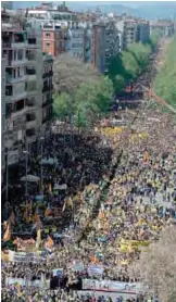  ??  ?? BARCELONA: People march during a demonstrat­ion to support Catalan pro-independen­ce jailed leaders and politician­s yesterday. —AFP