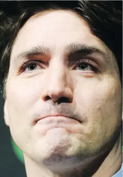  ?? RYAN REMIORZ / THE CANADIAN PRESS ?? Prime Minister Justin Trudeau speaks to the media at the Canadian Space Agency headquarte­rs Thursday, February 28, 2019 in St. Hubert, Que.