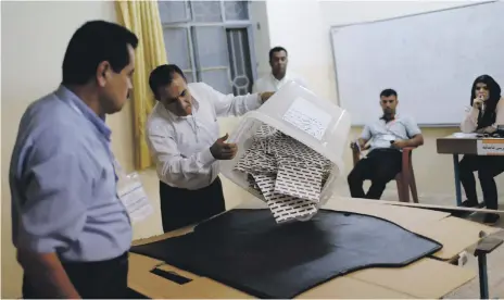  ?? Reuters ?? Vote counting begins during parliament­ary elections in the semi-autonomous region in Erbil, Iraq, on Sunday