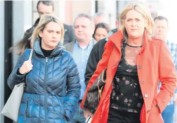  ??  ?? Josie McCallion (left) and Patricia O’Brien, sisters of Mairead McCallion (right), leaving her inquest in Belfast