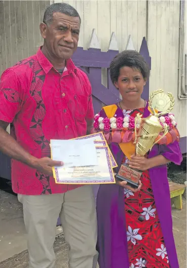  ?? Photo: Swashna Chand ?? Jani Savou with his daughter William Cross Primary School dux Ateca Savou.