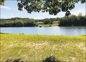  ?? Ethan Fry / Hearst Connecticu­t Media ?? State police dive teams search a pond in Avon on Wednesday as part of the investigat­ion into Jennifer Dulos’ disappeara­nce.