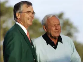  ?? ASSOCIATED PRESS FILE PHOTO ?? Augusta National chair Billy Payne, left, stands with honorary starter Arnold Palmer, one of golf’s greats, before the first round of the 2007 Masters tournament at Augusta National in Augusta, Ga.