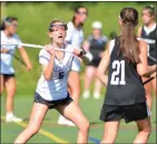  ?? KYLE FRANKO — TRENTONIAN PHOTO ?? Princeton Day’s Tessa Caputo (5) defends as Bishop Eustace’s Josette DeGour (21) controls the ball during a Non-Public B semifinal girls lacrosse game at Smoyer Field on Tuesday afternoon in Princeton.
