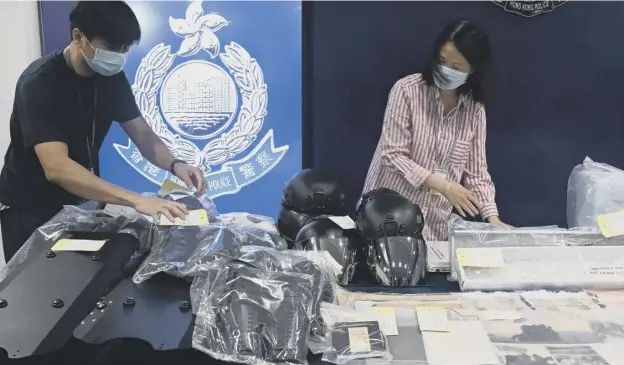  ??  ?? 0 The group of pupils were attempting to make explosives in a homemade laboratory in a hostel, Hong Kong police said