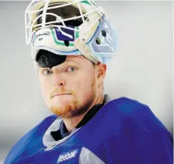  ?? REUTERS FILES ?? Canucks goaltender Cory Schneider admits he might soon explore the option of playing in Europe during the NHL lockout.