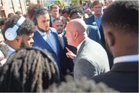  ??  ?? Tennessee coach Jeremy Pruitt gives his team a pep talk during the Vol Walk before the game Saturday. BRIANNA PACIORKA/NEWS SENTINEL