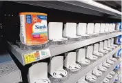 ?? ERIC GAY/ASSOCIATED PRESS ?? Shelves typically stocked with baby formula sit mostly empty at a store in San Antonio, Texas. Supply disruption­s have taken many leading brands off store shelves.