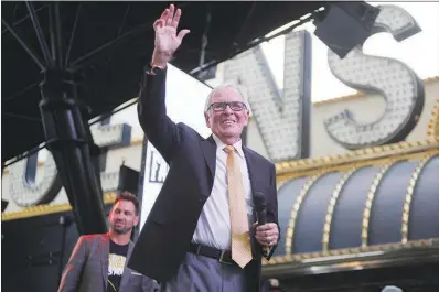  ?? STEVE MARCUS ?? Golden Knights team owner Bill Foley waves during the team’s Fan Fest in January at the Fremont Street Experience in downtown Las Vegas. After watching his expansion team nearly win the Stanley Cup, Foley says he is excited for the team’s second year to begin.