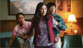  ?? Allyson Riggs / Associated Press ?? Stephanie Hsu, from left, Michelle Yeoh and Ke Huy Quan in a scene from “Everything Everywhere All At Once.”